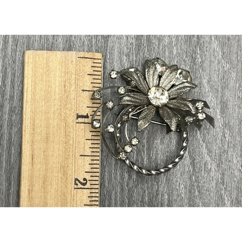 Vintage Silver Tone Floral Rhinestone Brooch Pin Clear Stones Swirl Design Retro